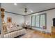 Bedroom featuring hardwood floors, a neutral color scheme, and a vanity at 23 Edgewater Aly, Isle of Palms, SC 29451