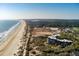 Sandcastle condo building on the beach. Surrounded by mature landscaping and the oceanfront at 2473 Shipwatch Rd, Kiawah Island, SC 29455