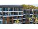 Modern multi-story condo complex with private balconies, offering a relaxing outdoor living space at 2473 Shipwatch Rd, Kiawah Island, SC 29455