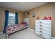 Bedroom featuring a twin bed, dresser, and lots of natural light at 252 Swamp Creek Ln, Moncks Corner, SC 29461