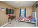 Bedroom featuring a twin bed, desk, and wall mounted tv at 252 Swamp Creek Ln, Moncks Corner, SC 29461