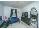 Bedroom featuring a twin bed, desk, and closet at 252 Swamp Creek Ln, Moncks Corner, SC 29461