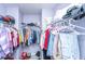 Walk-in closet is filled with clothing, shoes, and storage bins at 252 Swamp Creek Ln, Moncks Corner, SC 29461