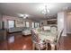 Open living room area with dining table, couch, and view of kitchen at 252 Swamp Creek Ln, Moncks Corner, SC 29461