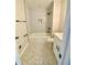 Newly renovated bathroom features white tile and modern fixtures at 2652 Elissa Dr, Charleston, SC 29414