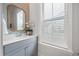 Powder room with a modern vanity, stylish mirror, and bright light at 2710 Mcfadden Way, Johns Island, SC 29455