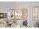 Stylish dining area features a modern chandelier, seating, and decor at 2710 Mcfadden Way, Johns Island, SC 29455