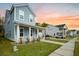 Charming two-story home with a inviting front porch and manicured lawn at 2710 Mcfadden Way, Johns Island, SC 29455