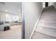 Bright, open-concept living room with large windows, plush seating, and stylish decor at 2710 Mcfadden Way, Johns Island, SC 29455