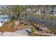 Community playground with wooden structures and a lake view, perfect for Gathering fun and outdoor adventures at 2710 Mcfadden Way, Johns Island, SC 29455