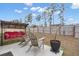 Relaxing backyard features a comfortable covered swing and an outdoor seating area at 319 Knawl Rd, Moncks Corner, SC 29461