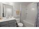 Clean bathroom with a tub-shower, vanity, and towel rack at 319 Knawl Rd, Moncks Corner, SC 29461
