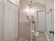 Cozy bathroom with gray granite vanity and white wainscoting gives the room a clean and sophisticated look at 3563 Bayden Bridge Ln, Mount Pleasant, SC 29466