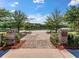Bolten Park entrance featuring brick pillars, benches, and a view of the lake at 3563 Bayden Bridge Ln, Mount Pleasant, SC 29466