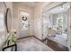 Charming entryway featuring a decorative mirror and a view into a bright, inviting living space at 3563 Bayden Bridge Ln, Mount Pleasant, SC 29466