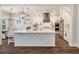 Stylish kitchen with a large island, white cabinets and stainless steel appliances at 3563 Bayden Bridge Ln, Mount Pleasant, SC 29466