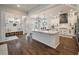 Bright, modern kitchen with a large center island, wooden floors, and stainless steel appliances at 3563 Bayden Bridge Ln, Mount Pleasant, SC 29466