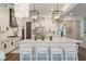 Open kitchen features a large island with seating, modern pendant lighting, and stainless steel appliances at 3563 Bayden Bridge Ln, Mount Pleasant, SC 29466