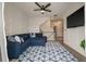 Inviting living room showcasing a comfortable sectional, stylish decor, and a view of the staircase at 3563 Bayden Bridge Ln, Mount Pleasant, SC 29466