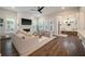 Bright living room with fireplace, tv and view to the mud room at 3563 Bayden Bridge Ln, Mount Pleasant, SC 29466