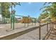 Community playground with swings, a wooden structure, and slide, perfect for recreation at 3563 Bayden Bridge Ln, Mount Pleasant, SC 29466