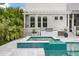 Relaxing pool with adjacent grilling station, offers a seamless blend of cooking and leisure at 3563 Bayden Bridge Ln, Mount Pleasant, SC 29466