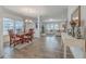 Open-concept living and dining area with hardwood floors and natural light at 428 Avocet Dr, Summerville, SC 29486
