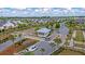 Beautiful community with colorful homes and a lovely water feature viewed from above on a sunny day at 455 Hidden Meadow Ln, Summerville, SC 29486