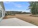 Enjoy the serene backyard with a patio, a large lawn, and a scenic water view at 455 Hidden Meadow Ln, Summerville, SC 29486