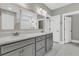 Bathroom featuring double sink vanity with gray cabinets and quartz countertop at 455 Hidden Meadow Ln, Summerville, SC 29486