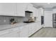 Clean kitchen with white cabinets, stainless appliances and gray countertops at 455 Hidden Meadow Ln, Summerville, SC 29486