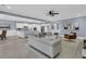 Bright living room featuring an open layout, a kitchen, and a dining area with ample seating at 455 Hidden Meadow Ln, Summerville, SC 29486