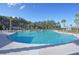 Large community pool with zero entry, seating, and shaded structures at 455 Hidden Meadow Ln, Summerville, SC 29486
