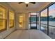 Inviting screened porch with door and windows offering tranquil outdoor views at 455 Hidden Meadow Ln, Summerville, SC 29486