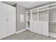 Walk-in closet with built in shelving, drawers, cabinets, and hardwood floors at 455 Hidden Meadow Ln, Summerville, SC 29486