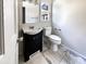 Updated bathroom with a black vanity and modern fixtures, next to the toilet at 503 Middleton Blvd, Summerville, SC 29485