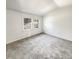 Bright bedroom featuring neutral carpet and a window offering natural light at 503 Middleton Blvd, Summerville, SC 29485