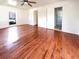 Empty bedroom featuring hardwood floors, a ceiling fan and ensuite bathroom at 503 Middleton Blvd, Summerville, SC 29485