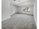 Bedroom featuring neutral carpet, fresh paint, and a large window at 503 Middleton Blvd, Summerville, SC 29485