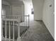 Stairway landing featuring carpet and fresh paint at 503 Middleton Blvd, Summerville, SC 29485