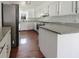 Bright kitchen with stainless steel appliances, granite countertops, and white cabinetry at 503 Middleton Blvd, Summerville, SC 29485