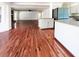 Spacious layout seamlessly connects living and kitchen areas, hardwood floors and white walls at 503 Middleton Blvd, Summerville, SC 29485