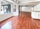 Bright living space featuring a window view of the pool, hardwood floors, and a fireplace at 503 Middleton Blvd, Summerville, SC 29485