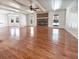 Spacious living room with hardwood floors, a brick fireplace, and an open layout at 503 Middleton Blvd, Summerville, SC 29485