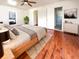 Spacious and bright main bedroom featuring hardwood floors, ceiling fan and ensuite bathroom at 503 Middleton Blvd, Summerville, SC 29485
