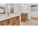 Bright bathroom featuring double vanities, spacious cabinets, and a walk-in closet at 520 Tranquil Waters Way, Summerville, SC 29486