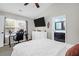 Inviting bedroom featuring a ceiling fan, a large bed, and access to an ensuite bathroom at 536 Castle Hall Rd, Mount Pleasant, SC 29464