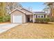 Charming single-story home with a well-maintained lawn and attached one-car garage at 536 Castle Hall Rd, Mount Pleasant, SC 29464