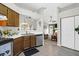 Well-lit kitchen with an open view to the living room featuring a stainless steel dishwasher at 536 Castle Hall Rd, Mount Pleasant, SC 29464