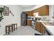 Cozy kitchen with stainless steel appliances, wood cabinets, and adjacent breakfast nook at 536 Castle Hall Rd, Mount Pleasant, SC 29464